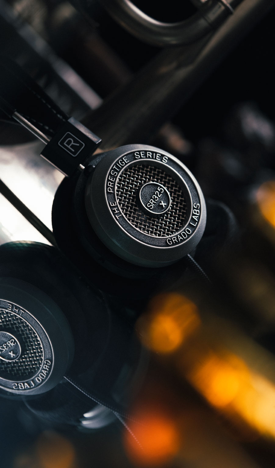 Photo of SR325x headphones with a blurred background.